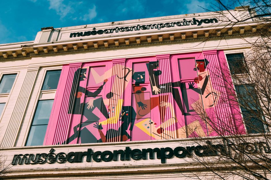 Vibrant mural on Musée d'Art Contemporain in Lyon, showcasing modern street art.