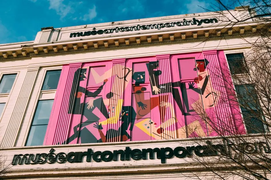 Vibrant mural on Musée d'Art Contemporain in Lyon, showcasing modern street art.
