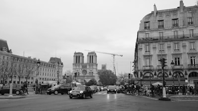 a city street with cars and buildings